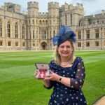 Autism Berkshire CEO Jane Stanford-Beale with MBE at Windsor Castle