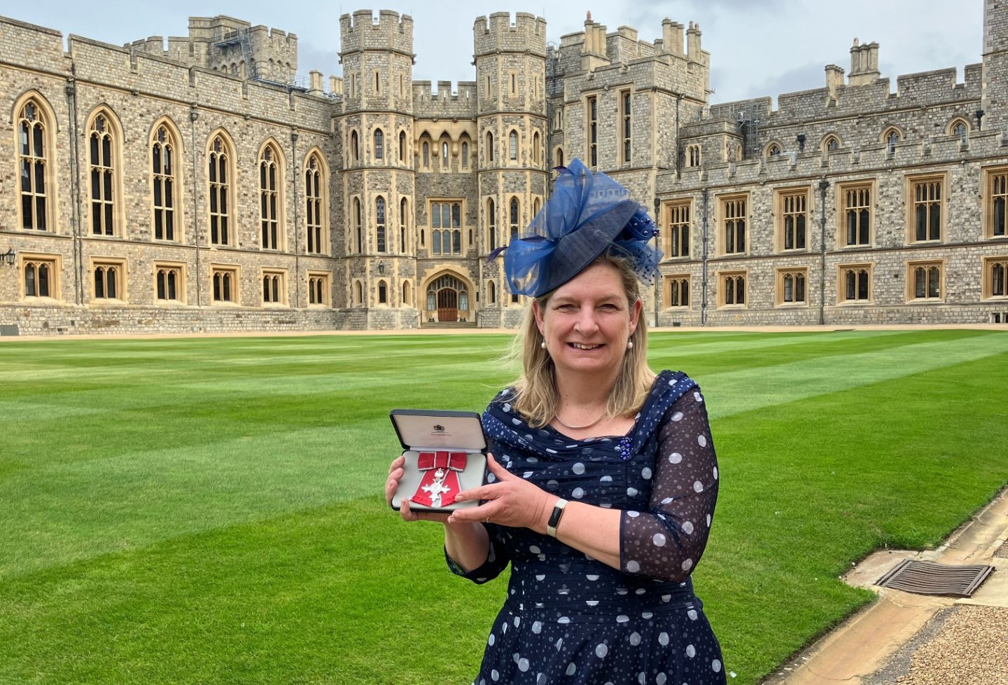 Autism Berkshire CEO Jane Stanford-Beale with MBE at Windsor Castle